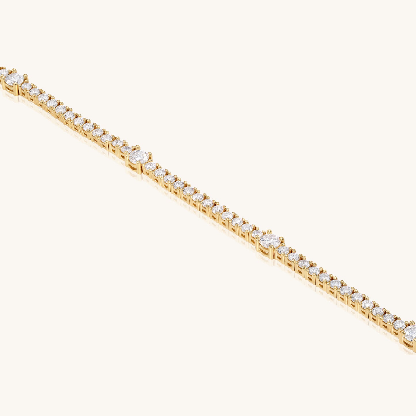 14K Solid Gold Tennis Bracelet With Smaller and larger Diamonds Design